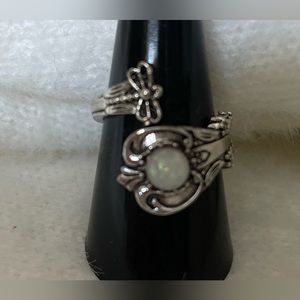 Sterling silver spoon ring with man made opal stone.